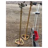 One Earthway precision garden seeder and two elevated garden sprinklers