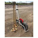 One Earthway precision garden seeder and two elevated garden sprinklers