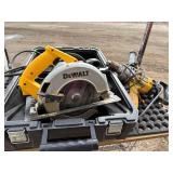 Electric Dewalt DW359 7 1/4 inch power saw with case and hammer drill.