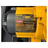 Electric Dewalt DW359 7 1/4 inch power saw with case and hammer drill.