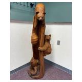 3 bears and a hive chainsaw carved totem by Vernon, S Pine, 2005