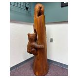 3 bears and a hive chainsaw carved totem by Vernon, S Pine, 2005
