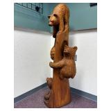 3 bears and a hive chainsaw carved totem by Vernon, S Pine, 2005