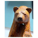 3 bears and a hive chainsaw carved totem by Vernon, S Pine, 2005