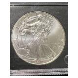 2011 AMERICAN SILVER EAGLE 1 TROY OZ .999 FINE SILVER SLABBED UNC