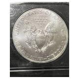 2011 AMERICAN SILVER EAGLE 1 TROY OZ .999 FINE SILVER SLABBED UNC