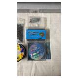 Fishing Tackle Lot Including Lures, Jig Heads, Hooks, and Fishing Line