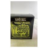 Box of Ernie Ball Regular Slinky Electric Guitar Strings 10-46