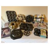 Collection of Specialty Baking Pans and Molds with Cookie Cutters and Cake Accessories