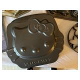 Collection of Specialty Baking Pans and Molds with Cookie Cutters and Cake Accessories