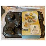 Collection of Specialty Baking Pans and Molds with Cookie Cutters and Cake Accessories