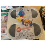 Collection of Specialty Baking Pans and Molds with Cookie Cutters and Cake Accessories