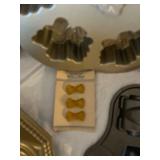 Collection of Specialty Baking Pans and Molds with Cookie Cutters and Cake Accessories