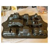 Collection of Specialty Baking Pans and Molds with Cookie Cutters and Cake Accessories