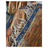 Handmade Woven Rug with Colorful Pattern and Fringe