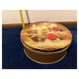 Assorted Craft Supplies and Decorative Items in Tin