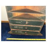 Vintage Wooden Cabinet with Labeled Drawers for Grooming Tools