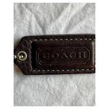 Coach Leather Handbag with Signature Design