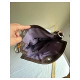 Coach Leather Handbag with Signature Design