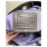 Coach Leather Handbag with Signature Design
