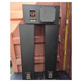 2 Polk Audio RT600i floor standing tower speakers and 1 Polk Audio CS400i center channel speaker.