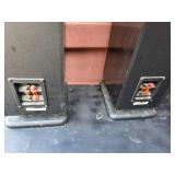 2 Polk Audio RT600i floor standing tower speakers and 1 Polk Audio CS400i center channel speaker.