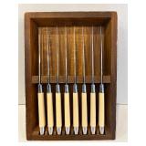 LR - Set of 8 Carvel Hall Stainless Steel Steak Knives with Cream Handles in Wooden Tray