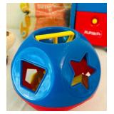 LR - Vintage Fisher-Price Jet, Playskool Postal Station, Shape Sorter, and Dominoes Set