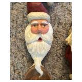 LL - Collection of 12 Hand-Carved Wooden Santa Figurines by Pobbies Crafty Crafts