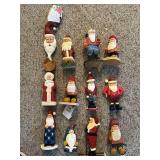 LL - Collection of 12 Hand-Carved Wooden Santa Figurines by Pobbies Crafty Crafts