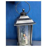 Snow Globe Lantern with a Snowman Scene Inside.