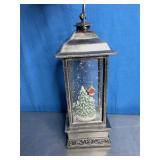 Snow Globe Lantern with a Snowman Scene Inside.