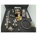 Grab Bag of Miscellaneous Jewelry, Pins, Vial of .999 Silver, 6 miniature silver spoons, ring, bracelets, other metal items