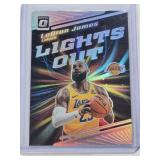 LeBron James 2023-24 Panini Donruss Optic Lights Out Silver Holo Prizm Insert #10 - Los Angeles Lakers Basketball Card