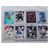 Lot of 8 Hockey Cards Most in Magnetic One Touch Cases Featuring Players Including Brenden Morrow, Dion Phaneuf, and Jaromir Jagr with Special Features Like Rookies and Limited Editions.