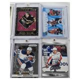 Lot of 8 Hockey Cards Most in Magnetic One Touch Cases Featuring Players Including Brenden Morrow, Dion Phaneuf, and Jaromir Jagr with Special Features Like Rookies and Limited Editions.