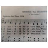 2 VINTAGE BRASS FRENCH HORNS PLUS SHEET MUSIC.