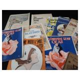 2 VINTAGE BRASS FRENCH HORNS PLUS SHEET MUSIC.