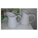 Assortment of Pitchers (4) plates, planters and more.