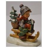 Goebel Hummel Figurine Boy on Sled with Tree and Lantern