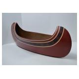 Decorative Wooden Canoe Centerpiece with Red and Black Accents, 28 in.