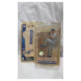 Lot of baseball Figurines, Catchers Mitt, and Trading Cards