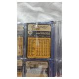 Lot of baseball Figurines, Catchers Mitt, and Trading Cards