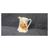 Collection of 4 Vintage Ceramic Pitchers and Hall Teapot