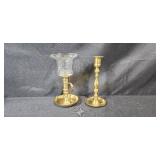 Collection of Vintage Glass Bottles, Brass Candlestick Holders, and Decorative Containers