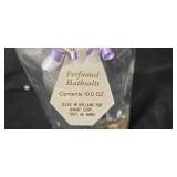 Collection of Vintage Glass Bottles, Brass Candlestick Holders, and Decorative Containers