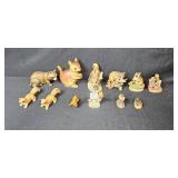 Collection of Woodland Animal Porcelain Figurines Including Raccoons and Squirrels
