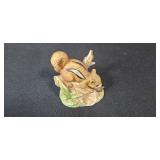 Collection of Woodland Animal Porcelain Figurines Including Raccoons and Squirrels