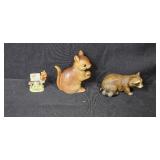Collection of Woodland Animal Porcelain Figurines Including Raccoons and Squirrels