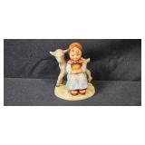 German Porcelain and Stoneware Collection with Nymphenburg Lion, Hummel Figurine, and Beer Steins